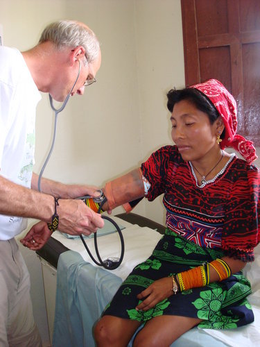 Medical Professional Serving a Kuna Woman